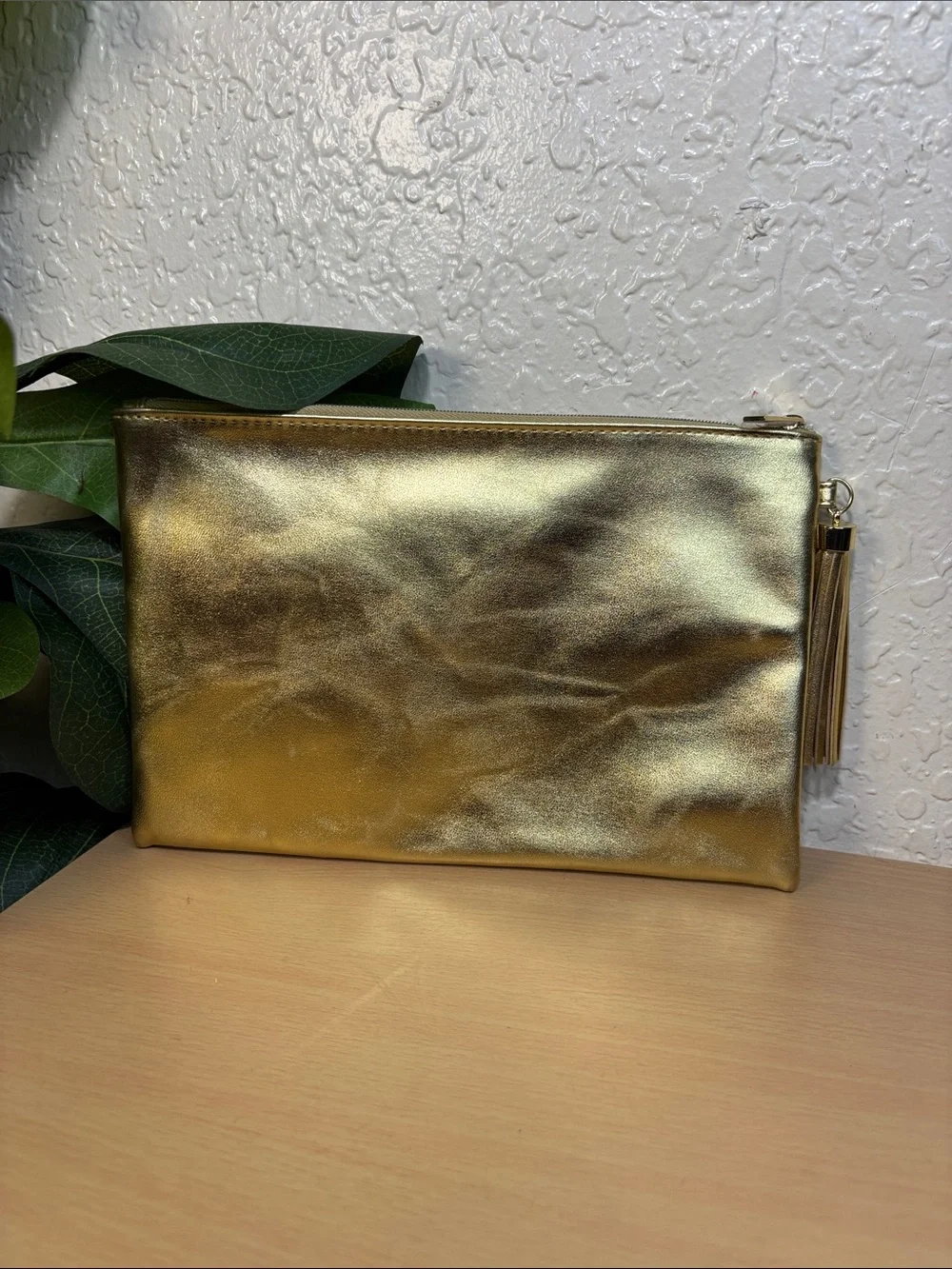 Yves Saint Laurent Metallic Gold Tassel Zip Pouch